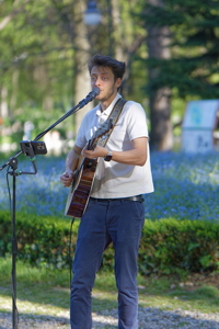 Boy playing guitar in the park